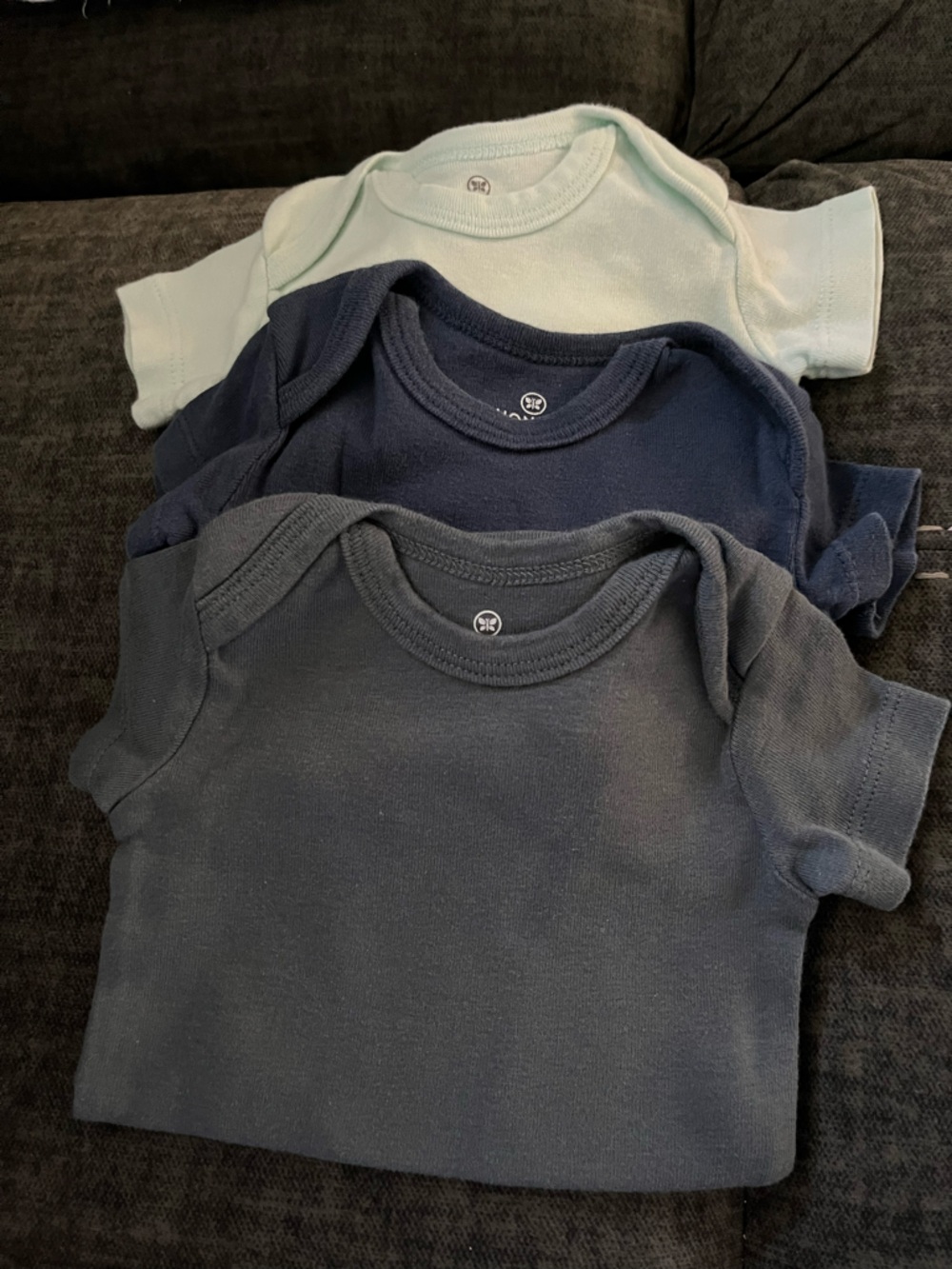 The Honest Company 3-Pack Short Sleeve Bodysuits in Mint, Navy, and Charcoal